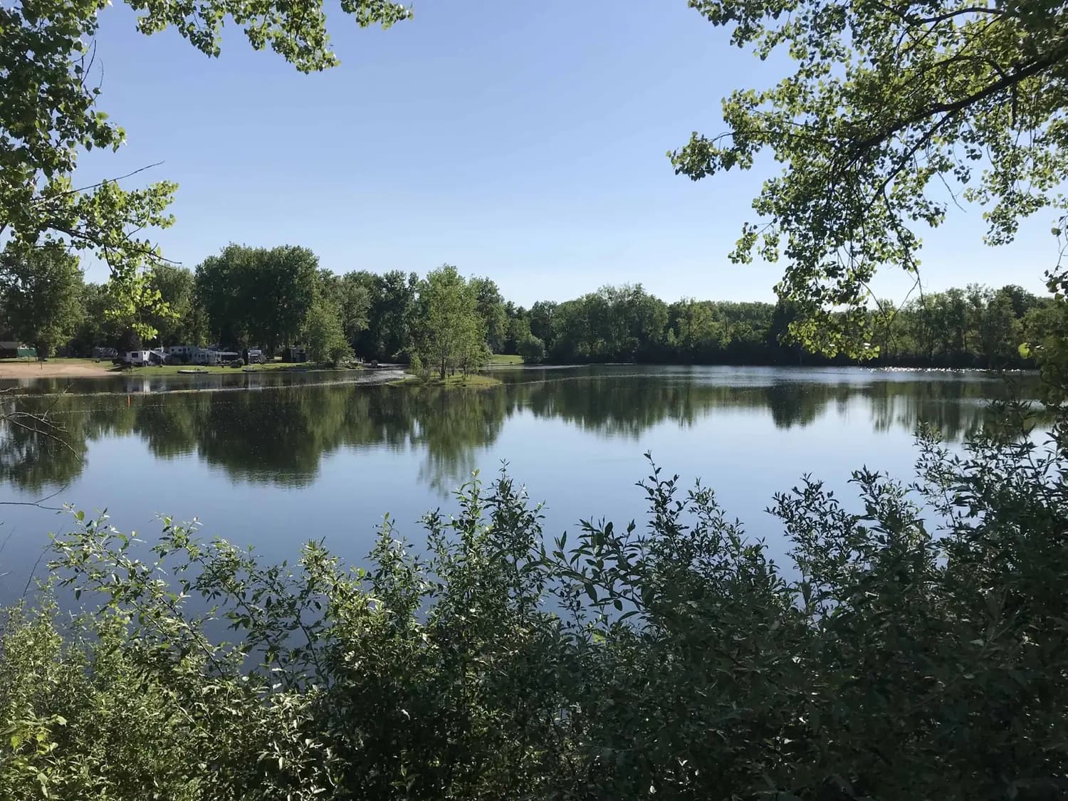 The spring-fed lake and sandy beach